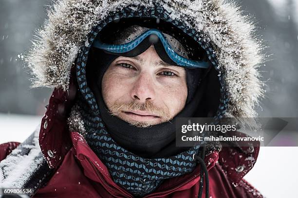 portrait of young skier - parka stock pictures, royalty-free photos & images