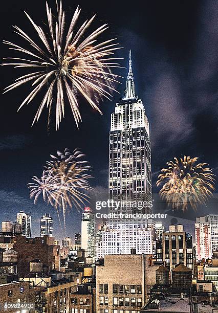 new york city empire state for the new year fireworks - empire state building at night stock pictures, royalty-free photos & images