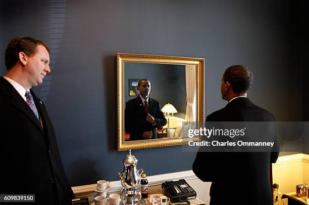 In a holding room at the Capital Barack H. Obama spends a last couple of moments with his wife Michelle before he is sworn in by Chief Justice John...