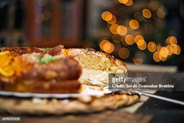 tasty sweet christmas. close up of a christmas fruitcake. - rosca de reyes stockfoto's en -beelden
