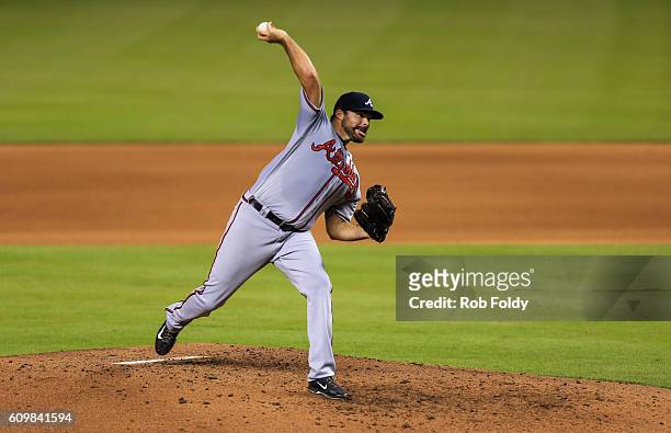 Josh Collmenter of the Atlanta Braves pitches during the game against the Miami Marlins at Marlins Park on September 22, 2016 in Miami, Florida.