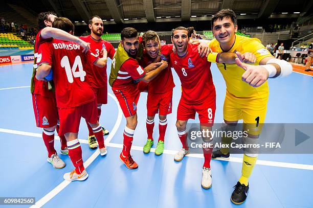 Vitaliy Borisov, Thiago Bolinha, Ramiz Chovdarov, Vassoura, Rizvan Farzaliyev and Emin Kurdov of Azerbaijan celebrate after the FIFA Futsal World Cup...