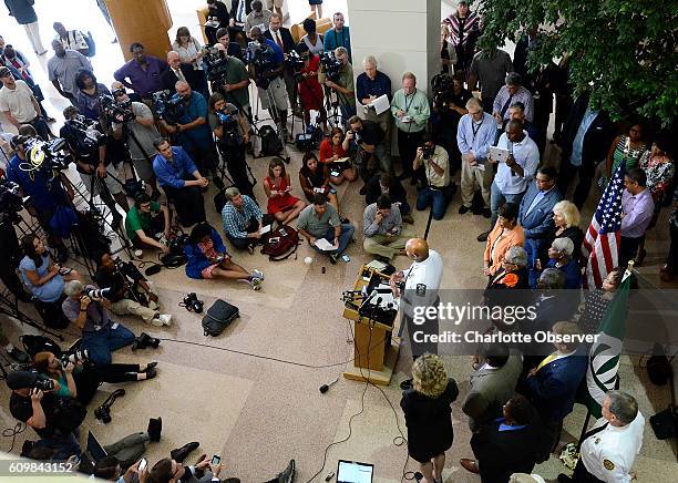 Horde of local and national media attended a news conference after a second night of violent protests, at Charlotte-Mecklenburg Police Department...