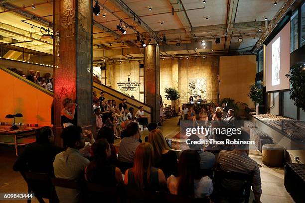 Journalists Wesley Morris and Jenna Wortham speak during NYT Mag Live: A Special Voyages Edition at Neuehouse on September 22, 2016 in New York City.