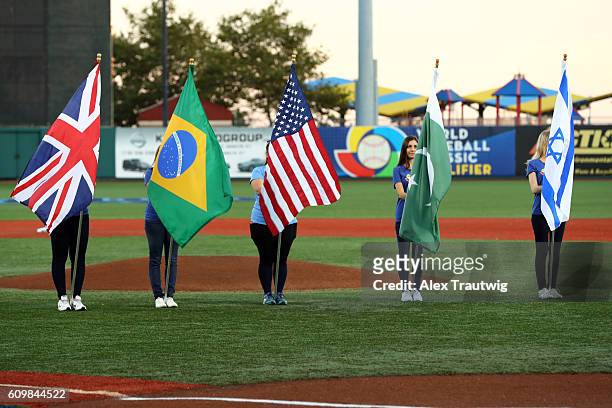 The flags of the countries represented at the Brooklyn Qualifier are seen on the field during the pre-game ceremony prior to Game 2 of the 2016 World...