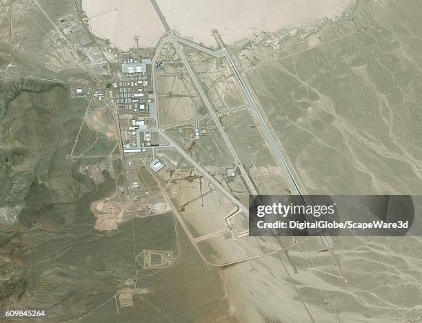 DigitalGlobe via Getty Images satellite image Area 51. The United States Air Force facility commonly known as Area 51 is a remote detachment of...