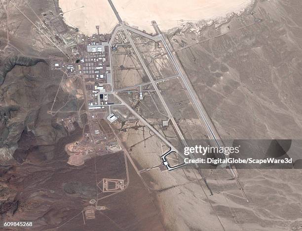 DigitalGlobe via Getty Images satellite image Area 51. The United States Air Force facility commonly known as Area 51 is a remote detachment of...