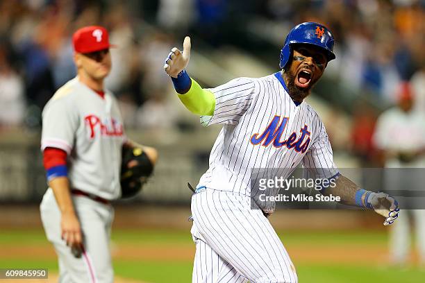 Jose Reyes of the New York Mets celebrates after hitting a game tying two run home run in the bottom of the ninth inning against the Philadelphia...