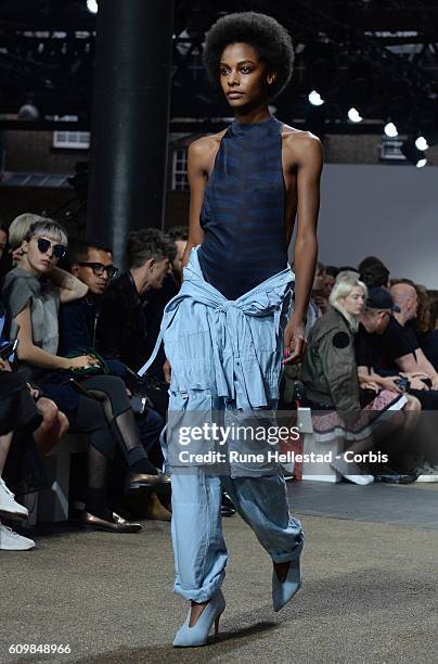 Model walks the runway at the Topshop Unique show during London Fashion Week Spring/ Summer 2017 on September 18, 2016 in London, United Kingdom.