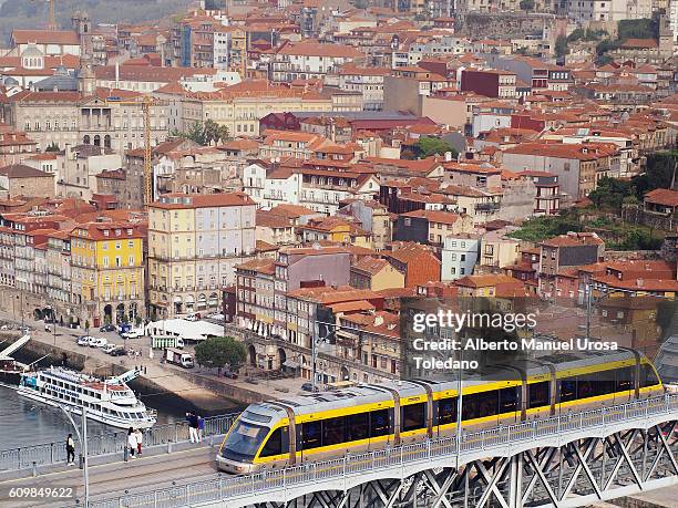 portugal, porto, tram at luiz i bridge - portwein stock-fotos und bilder