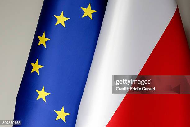 the polish and the european union flags - poland european union stock pictures, royalty-free photos & images