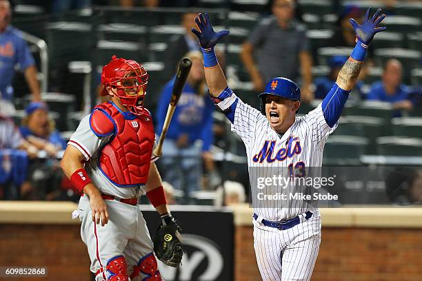 Asdrubal Cabrera of the New York Mets celebrates after hitting a game winning walk-off three run home run in the bottom of the twelfth inning against...