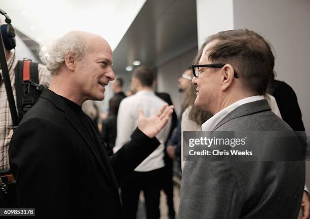 Photographers Timothy Greenfield-Sanders and Matthew Rolston attend the opening celebration for IDENTITY: Timothy Greenfield-Sanders The List...