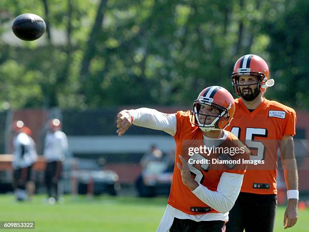 Quarterback Cody Kessler of the Cleveland Browns throws a pass while quarterback Charlie Whitehurst during practice on September 22, 2016 at the...