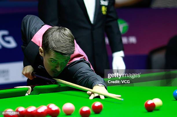 Michael Holt of England plays a shot in the second round match against Ronnie O'Sullivan of England on day four of the Shanghai Masters 2016 at...