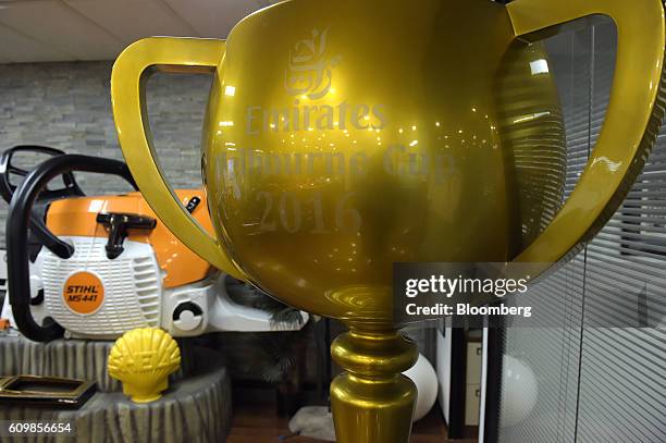 Fiberglass replica of the Emirates Melbourne Cup trophy stands on display at a King's Fiberglass Pty. Ltd. Facility in Melbourne, Australia, on...