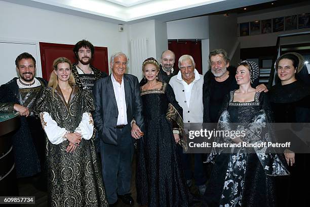 French Actors Jean-Paul Belmondo and Charles Gerard pose with actors of the play Adrien Melin, Coralie Audret, Gael Giraudeau, Beatrice Agenin, Yvan...