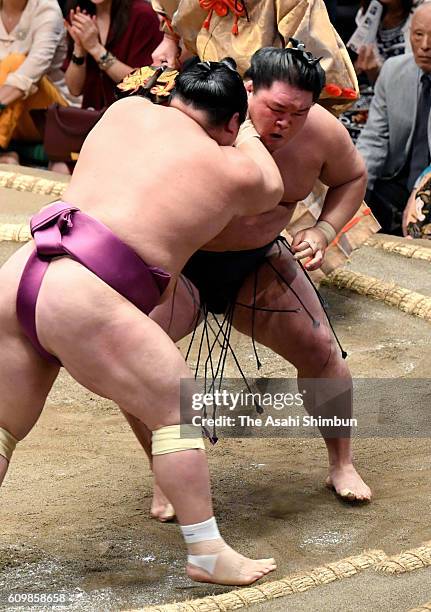 Ozeki Goeido and Takarafuji compete during day five of the Grand Sumo Autumn Tournament at Ryogoku Kokugikan on September 15, 2016 in Tokyo, Japan.