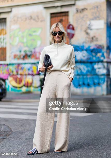 Lisa Hahnbeuck wearing an Athleisure Look, Reebock sweater, Knit Pants Molli, sunglasses Givenchy, Adiletten, Chanel Boy Bag outside Fendi during...
