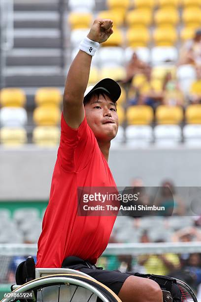 Takuya Miki of Japan celebrates a point during the Wheelchair Tennis Men's Doubles Bronze medal match against Shingo Kunieda and Satoshi Saida of...