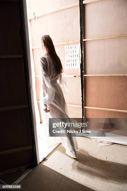 An alternative view of a model walking out onto the runway at the Irynvigre show during London Fashion Week Spring/Summer collections 2017 on...