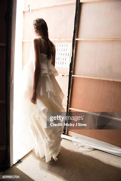 An alternative view of a model walking out onto the runway at the Irynvigre show during London Fashion Week Spring/Summer collections 2017 on...