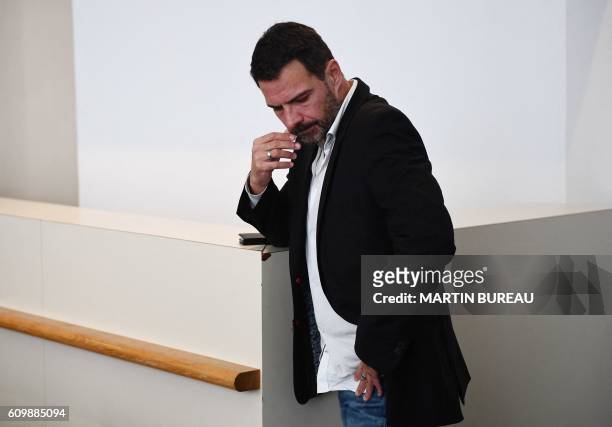 French "rogue trader" Jerome Kerviel waits before the start of his appeal trial at Versailles courthouse, outside Paris, on September 23, 2016. -...