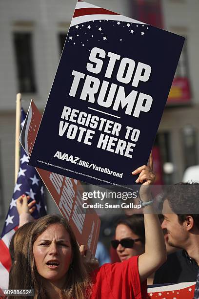 An activist protesting against Republican U.S. Elections candidate Donald Trump attends an event to urge U.S. Citizens abroad to vote at the...