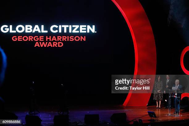 Olivia Harrison and Dhani Harrison accept the inaugural Global Citizen George Harrison Award from Paul Simon at the 2016 "Global Citizen: The World...