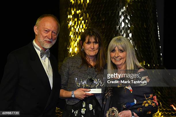 Gillian Saunders surrounded by Jim Robertson and Dame Suzie Moncrieff and after receiving the Brancott Estate Supreme WOW¨ Award at the World of...