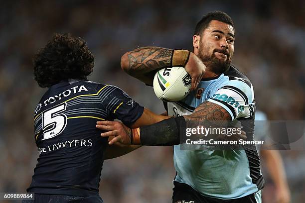 Andrew Fifita of the Sharks is tackled during the NRL Preliminary Final match between the Cronulla Sharks and the North Queensland Cowboys at Allianz...