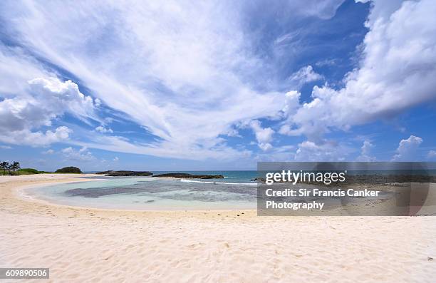 caribbean beach with turquoise waters, white sand and barrier reef in cayo santa maria, cuba - cayo santa maria stock pictures, royalty-free photos & images