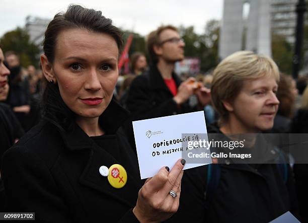 Supporters of abortion participate in the black protest on September 22, 2016 in Warsaw, Poland. The action is organized to express the opposition to...