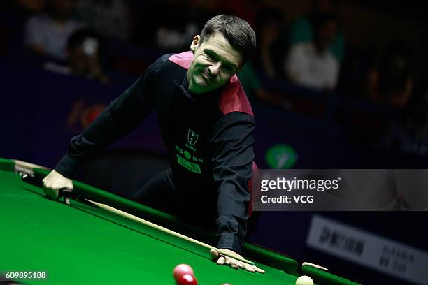 Michael Holt of England reacts in the quarter-final match against Ding Junhui of China on day five of the Shanghai Masters 2016 at Shanghai Grand...