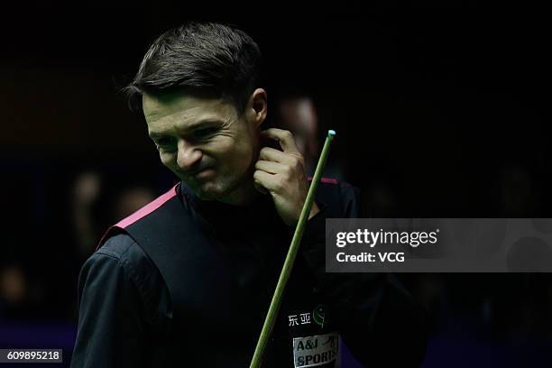 Michael Holt of England reacts in the quarter-final match against Ding Junhui of China on day five of the Shanghai Masters 2016 at Shanghai Grand...