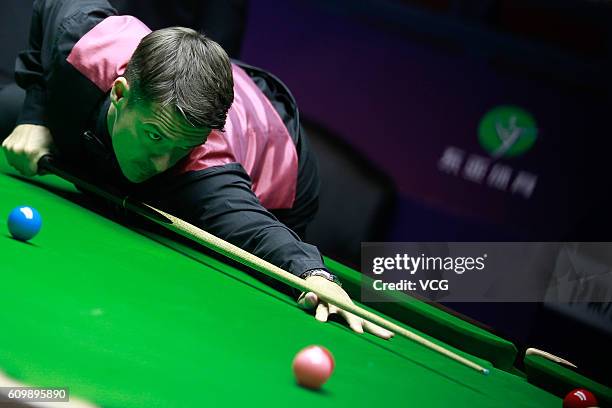 Michael Holt of England plays a shot in the quarter-final match against Ding Junhui of China on day five of the Shanghai Masters 2016 at Shanghai...