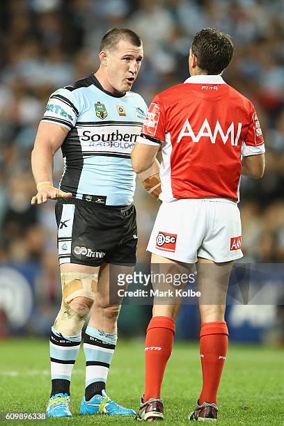 Paul Gallen of the Sharks makes his point to referee Gerard Sutton during the NRL Preliminary Final match between the Cronulla Sharks and the North...