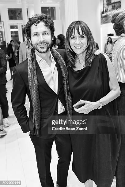Cristiano Magni and Cinzia Brandi attend An Intimate Conversation with Deepak Chopra, Brunello Cucinelli & Harper's Bazaar at Brunello Cucinelli Soho...