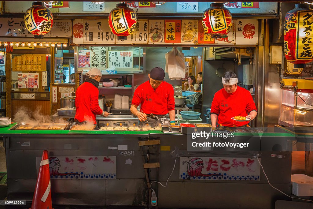Japan city nightlife cooks serving traditional fast food Osaka