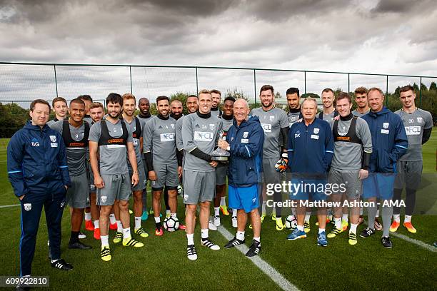 Darren Fletcher of West Bromwich Albion presents Head Coach Tony Pulis with a Ship's Decanter to commemorate his 1000th match as a manager at West...