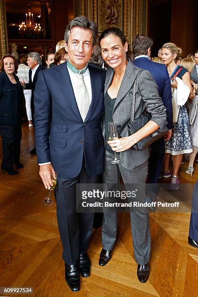 Cyril Karaoglan and Ines Sastre attend Cyril Karaoglan receives the Medal of Commander of Arts and Letters at Opera Garnier on September 23, 2016 in...