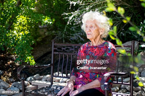 Beautiful Pensive Senior Woman Outdoors, Lost in Thoughts Beautiful Pensive Senior Woman Outdoors, Lost in Thoughts