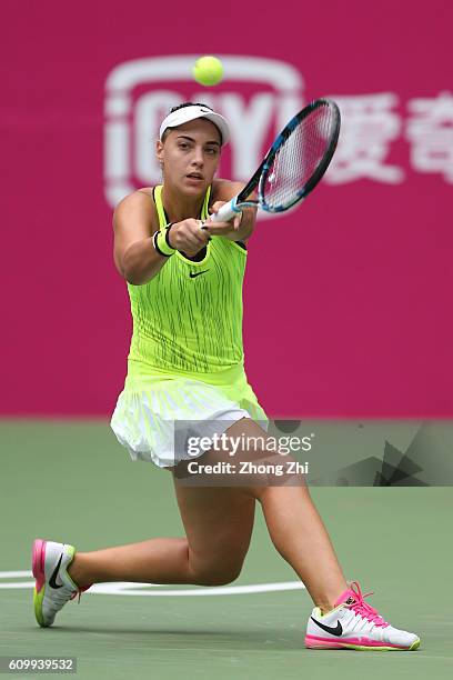 Ana Konjuh of Croatia returns a shot against Jelena Jankovic of Serbia on Day 5 of WTA Guangzhou Open on September 23, 2016 in Guangzhou, China.