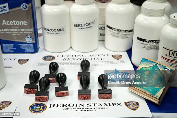 Heroin stamps, used to brand a specific batch of the drug, are displayed before a press conference regarding a major drug bust, at the office of the...