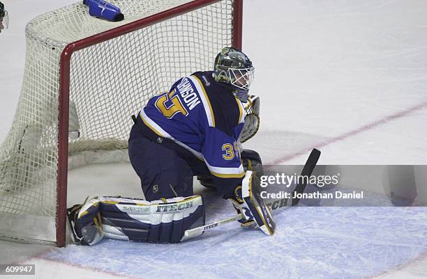 Goalie Brent Johnson of the St. Louis Blues defends the net against the Chicago Blackhawks in game four of the Stanley Cup playoffs at the United...