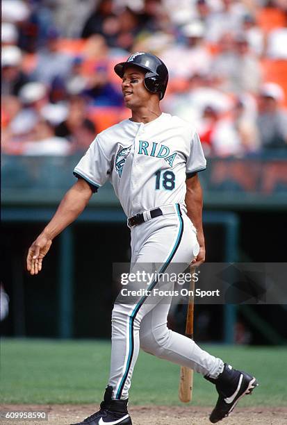 Moises Alou of the Florida Marlins bats against the San Francisco Giants during an Major League Baseball game circa 1997 at Candlestick Park in San...