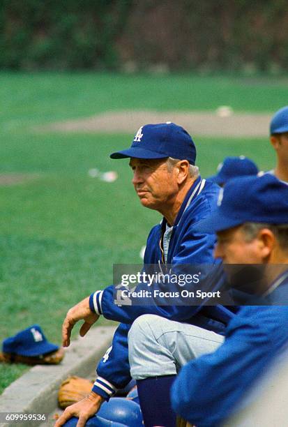 Manager Walter Alston of the Los Angeles Dodgers looks on from the dugout against the Chicago Cubs during an Major League Baseball game circa 1968 at...