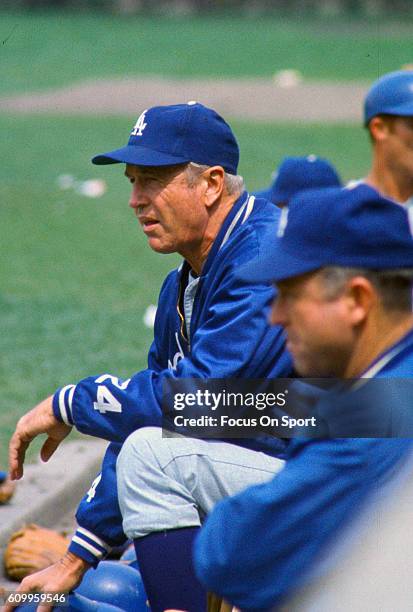 Manager Walter Alston of the Los Angeles Dodgers looks on from the dugout against the Chicago Cubs during an Major League Baseball game circa 1968 at...