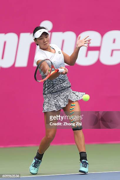 Chang Liu of China in action with Jia-jing Lu of China during the doubles match against Asia Muhammad of USA and Shuai Peng of China on Day 5 of WTA...
