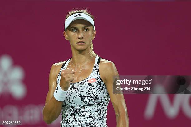 Lesia Tsurenko of Ukraine celebrates a point during the match against Anett Kontaveit of Estonia on Day 5 of WTA Guangzhou Open on September 23, 2016...